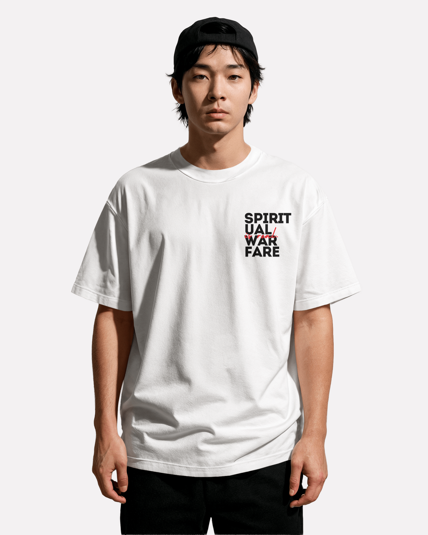 model wearing Spiritual warfare,spiritual clothing,oversized tshirt,tshirt,third journey,warfare,war,protection